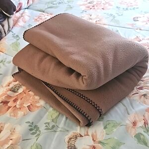 Attitude blanket Chocolate brown throw 59x87 photo on queen bed. Soft fe…